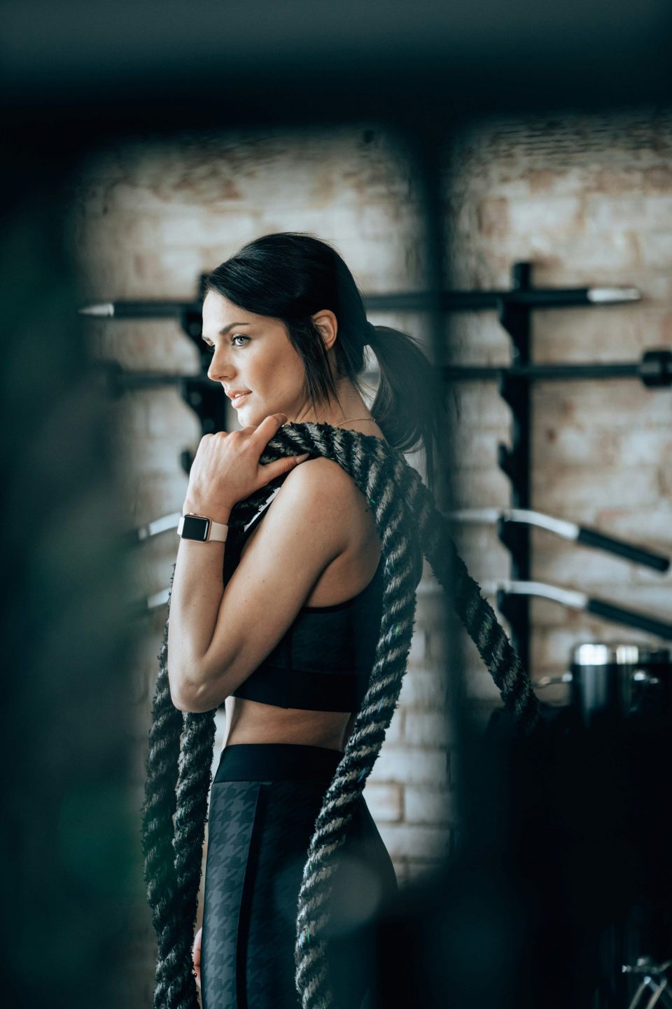 Woman holding gym ropes